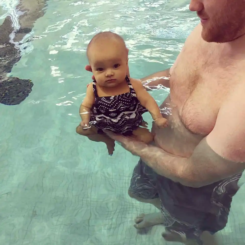 Isla's first swimming lessons. She was not impressed as you can tell by her scowl